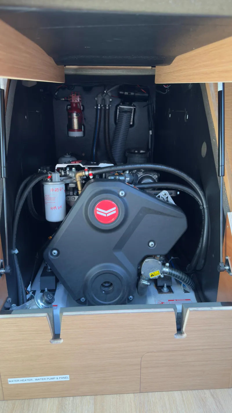 Slide: The Image of Engine compartment of 2022 Jeanneau Sun Odyssey 410 sailboat. - 14