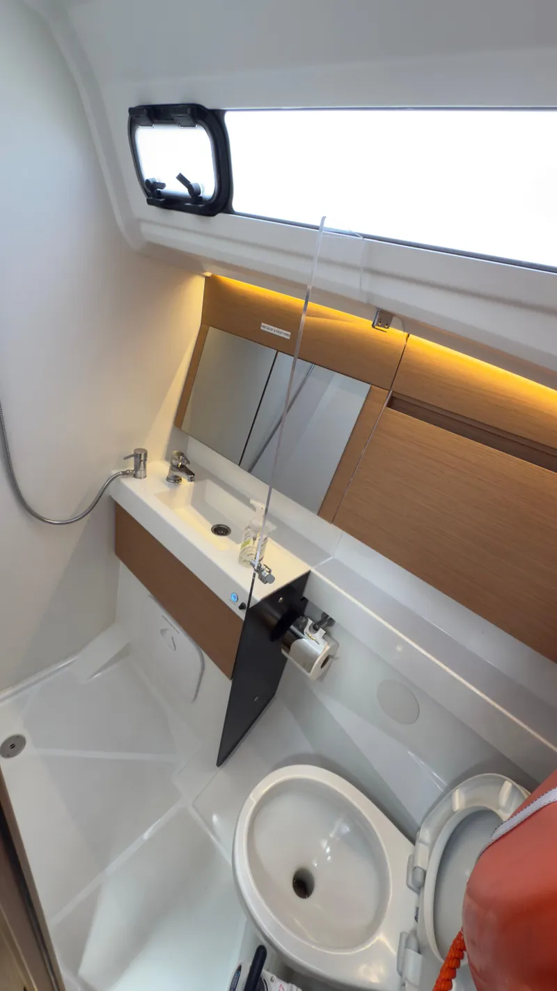 Slide: The Image of Modern bathroom in 2022 Jeanneau Sun Odyssey 410 yacht with sleek design and fixtures. - 20