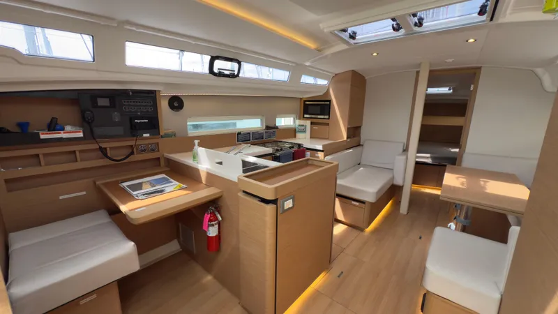 Slide: The Image of Interior of 2022 Jeanneau Sun Odyssey 410 sailboat, featuring modern design and spacious layout. - 4