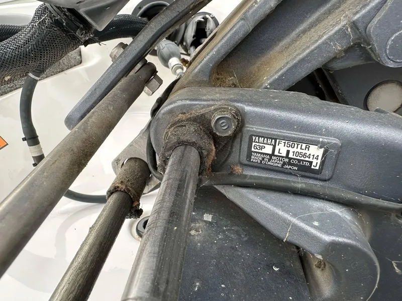 Slide: The Image of Close-up of a Yamaha F150TLR engine part on a 2009 Skeeter SL 190 boat. - 38