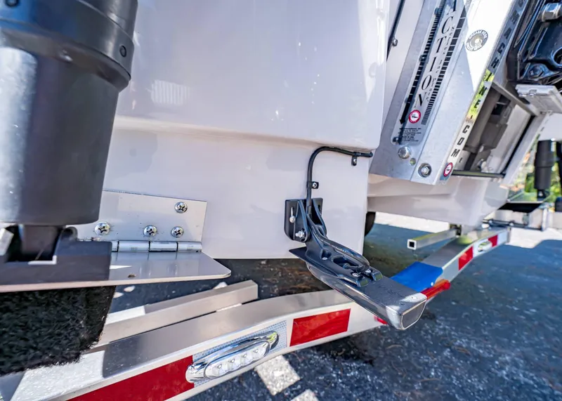 Slide: The Image of 2024 Spyder FX 19 Vapor boat trailer hitch detail, showcasing sturdy construction and design. - 25