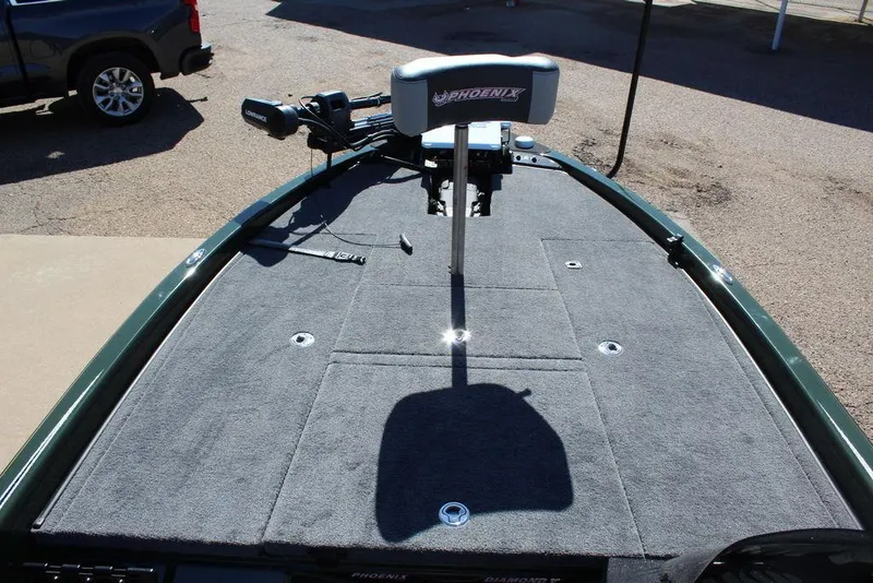 Slide: The Image of 2025 Phoenix 920 Elite II boat deck with carpeted surface and mounted equipment. - 20