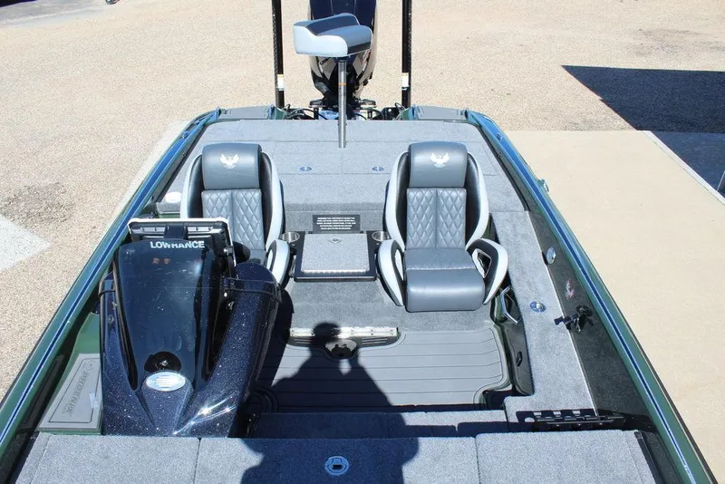 Slide: The Image of 2025 Phoenix 920 Elite II boat interior with dual seats and advanced navigation system. - 23