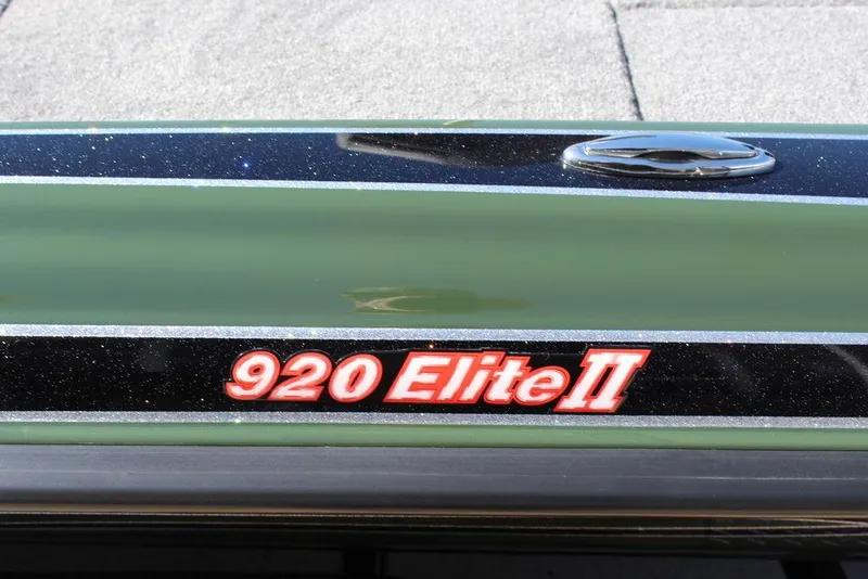 Slide: The Image of 2025 Phoenix 920 Elite II logo on a sleek green surface. - 24
