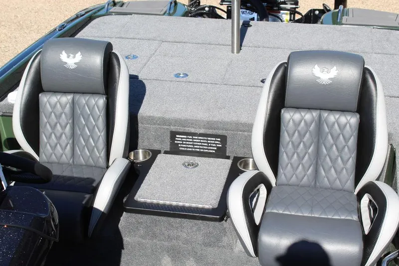 Slide: The Image of Two luxurious seats on a 2025 Phoenix 920 Elite II boat. - 25
