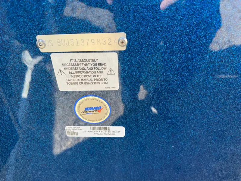 Slide: The Image of 2024 Nitro ZV19 Sport boat identification plate with safety instructions and certification label. - 18