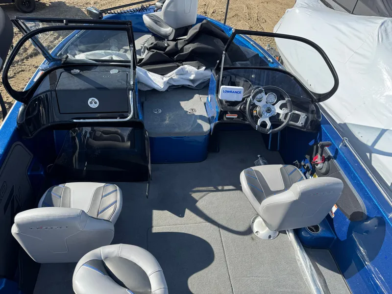 Slide: The Image of 2024 Nitro ZV19 Sport boat interior with seating and dashboard, featuring modern design and controls. - 4