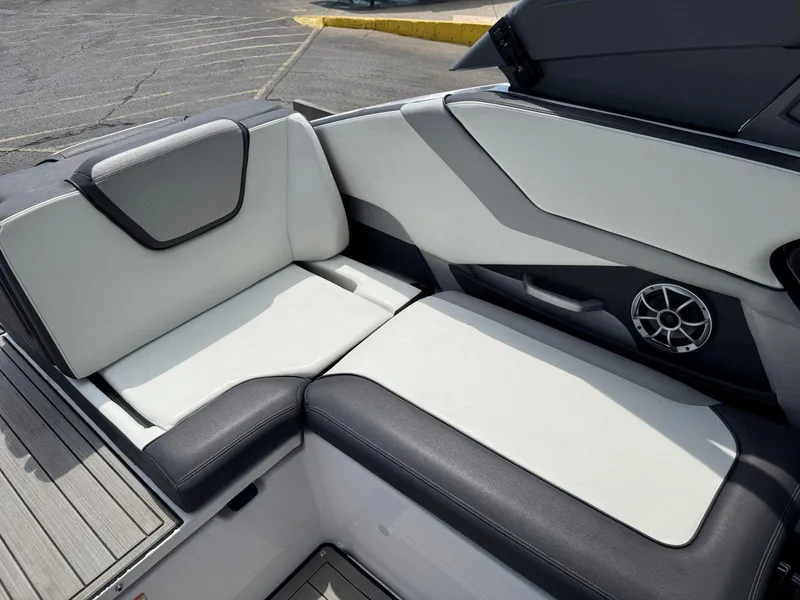 Slide: The Image of 2021 Yamaha Boats 252SE interior seating with sleek design and modern upholstery. - 12