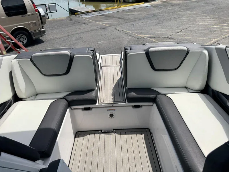 Slide: The Image of 2021 Yamaha Boats 252SE interior with sleek seating and modern design. - 15