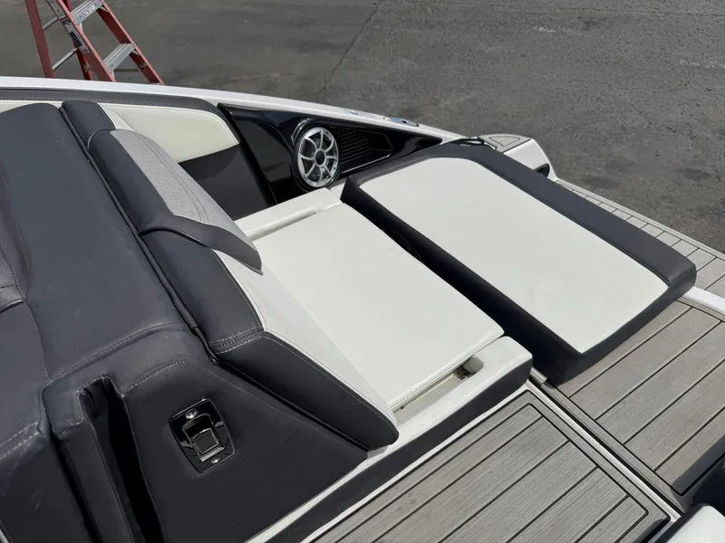 Slide: The Image of 2021 Yamaha Boats 252SE interior with sleek seating and modern design. - 17