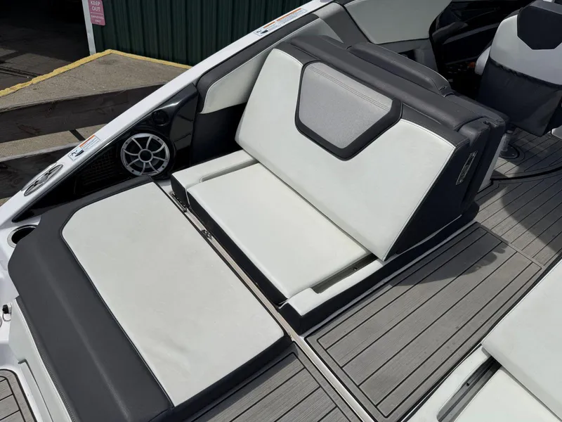 Slide: The Image of 2021 Yamaha Boats 252SE interior with sleek seating and modern design. - 19