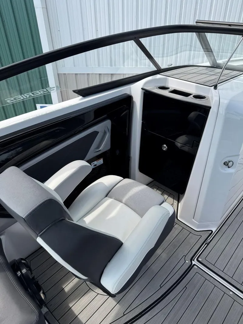 Slide: The Image of 2021 Yamaha Boats 252SE interior with sleek seating and modern design. - 23