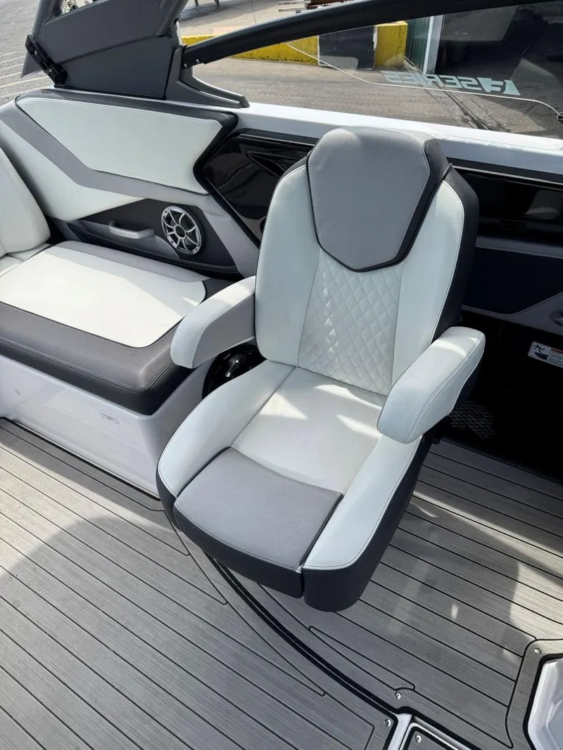 Slide: The Image of 2021 Yamaha Boats 252SE interior with sleek seating and modern design. - 25