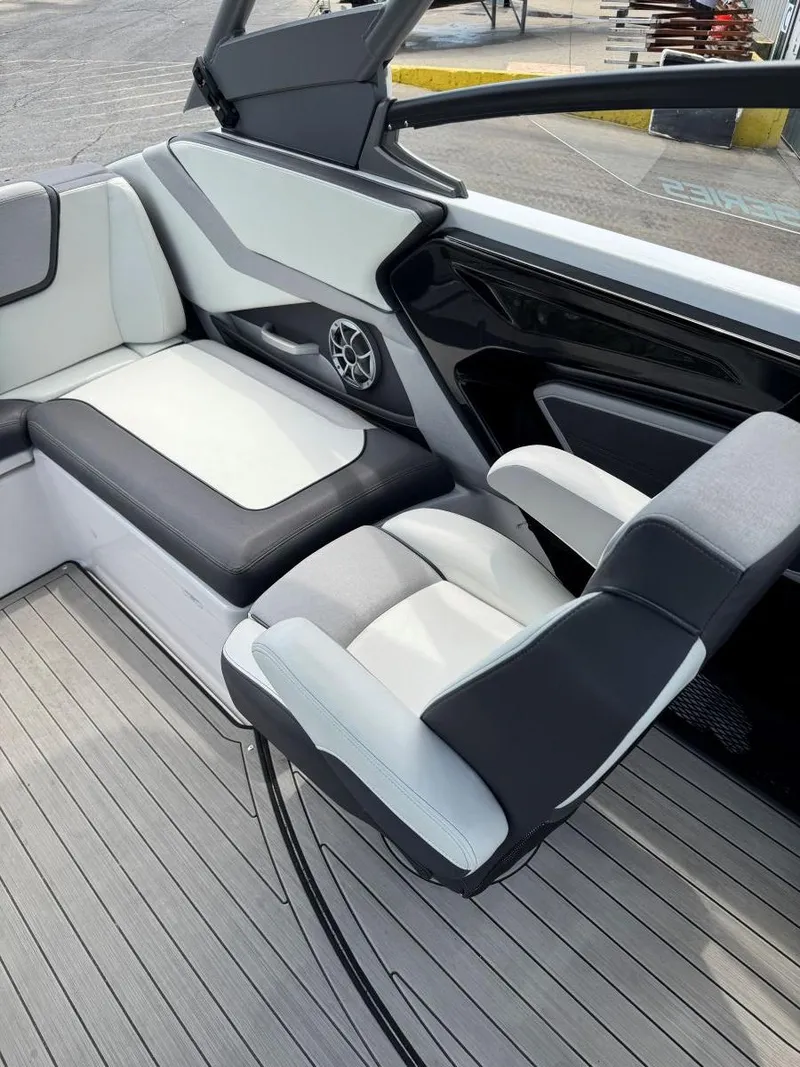 Slide: The Image of 2021 Yamaha Boats 252SE interior with sleek seating and modern design. - 26