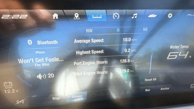 Slide: The Image of Dashboard of 2021 Yamaha Boats 252SE showing speed, engine hours, and music details. - 31