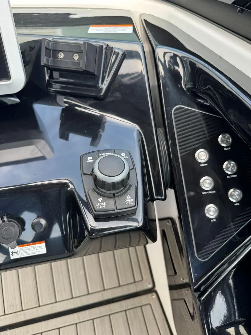 Slide: The Image of Control panel of 2021 Yamaha Boats 252SE with sleek design and modern features. - 36