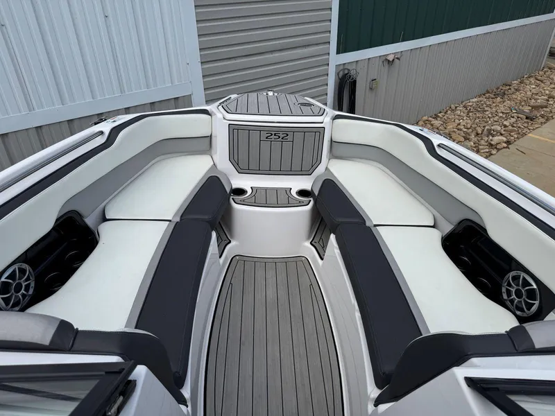 Slide: The Image of 2021 Yamaha Boats 252SE interior with sleek seating and modern design. - 39