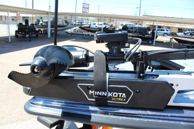 Slide: The Image of Minn Kota Ultrex motor on 2025 Phoenix 921 ELITE boat, displayed outdoors. - 10
