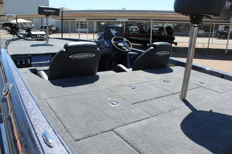 Slide: The Image of 2025 Phoenix 921 ELITE boat interior with dual seats and spacious deck. - 15