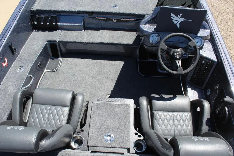 Slide: The Image of 2025 Phoenix 921 ELITE boat interior with dual seats and modern dashboard. - 18