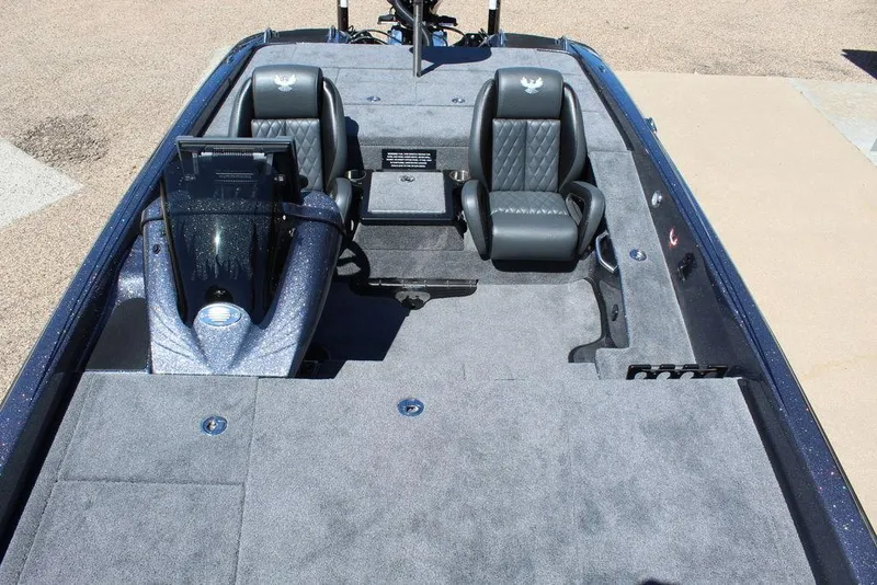 Slide: The Image of 2025 Phoenix 921 ELITE boat interior with dual seats and spacious deck. - 22