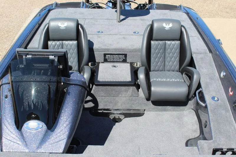 Slide: The Image of 2025 Phoenix 921 ELITE boat interior with dual seats and sleek design. - 23