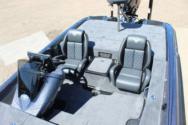 Slide: The Image of 2025 Phoenix 921 ELITE boat interior with dual seats and control panel. - 24