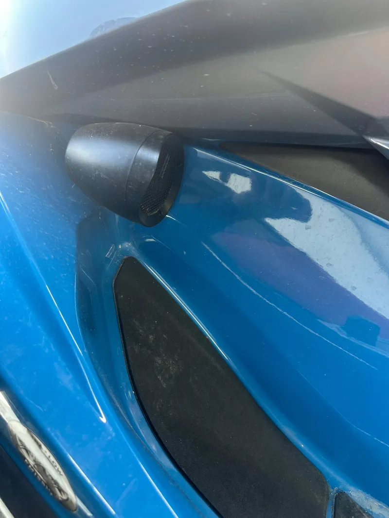 Slide: The Image of 2019 Sea-Doo GTI SE 130, close-up of blue body and black detailing. - 11