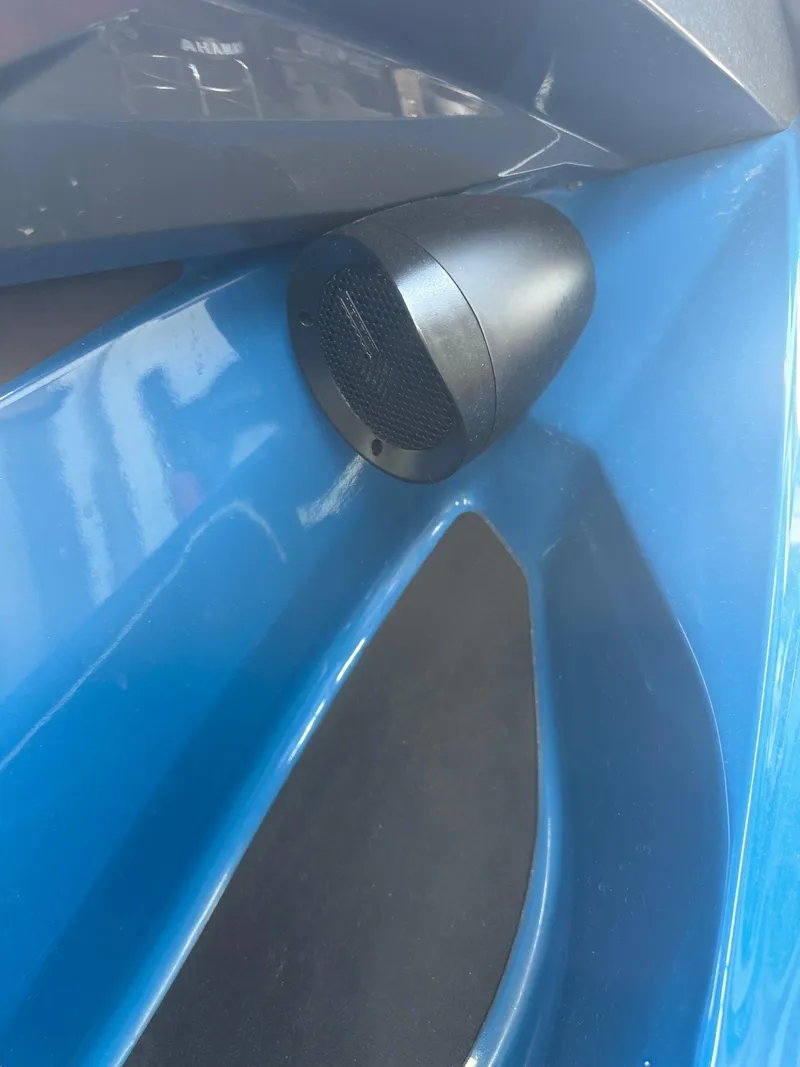 Slide: The Image of 2019 Sea-Doo GTI SE 130, blue exterior with a mounted speaker. - 12