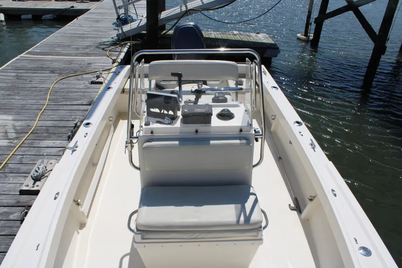 Slide: The Image of 2006 Parker 1801 Center Console boat docked at a marina. - 20