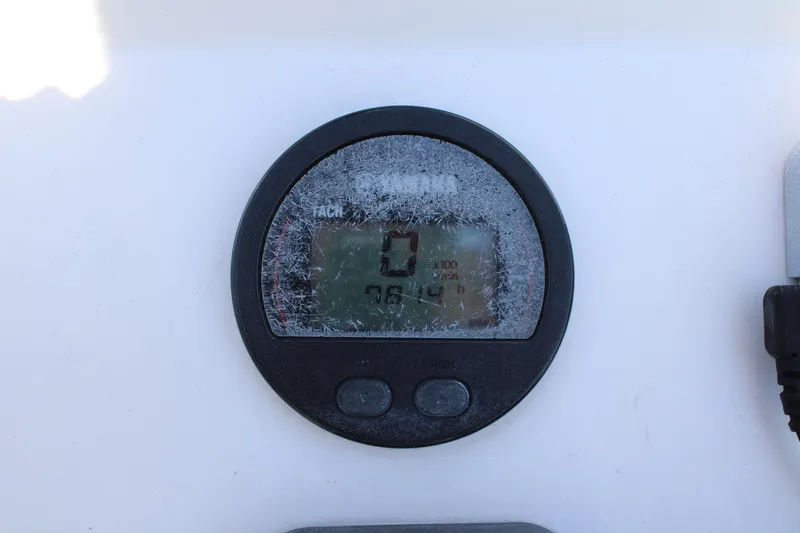 Slide: The Image of Close-up of a Yamaha tachometer on a 2006 Parker 1801 Center Console boat. - 25