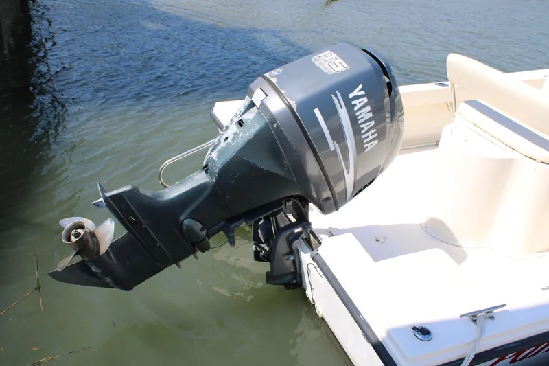 Slide: The Image of 2006 Parker 1801 Center Console boat with Yamaha outboard motor on water. - 5