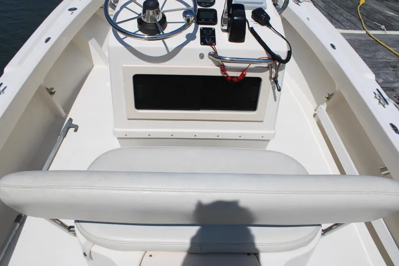Slide: The Image of 2006 Parker 1801 Center Console boat interior with steering wheel and controls. - 9