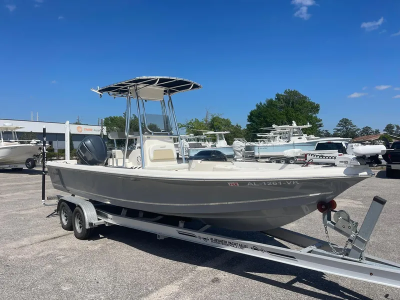 Slide: The Image of 2020 Bulls Bay 2400 boat on trailer in sunny marina setting. - 1