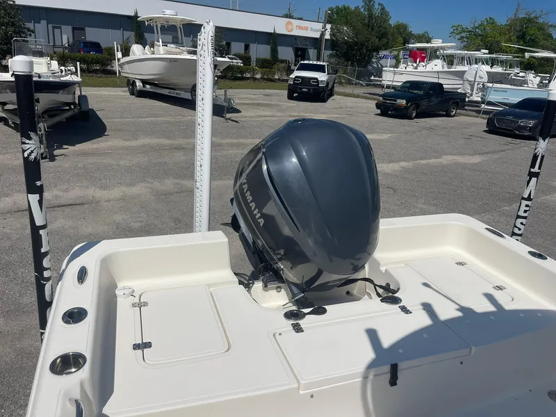 Slide: The Image of 2020 Bulls Bay 2400 boat with Yamaha outboard motor in a marina setting. - 11