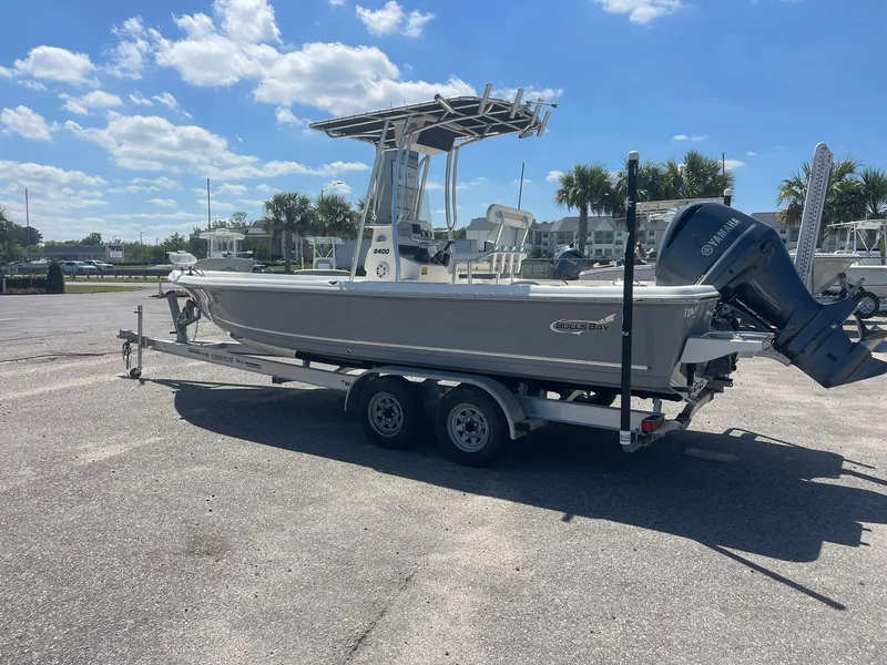 Slide: The Image of 2020 Bulls Bay 2400 boat on trailer under clear blue sky. - 4