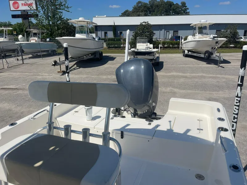 Slide: The Image of 2020 Bulls Bay 2400 boat with outboard motor in a dealership lot. - 9