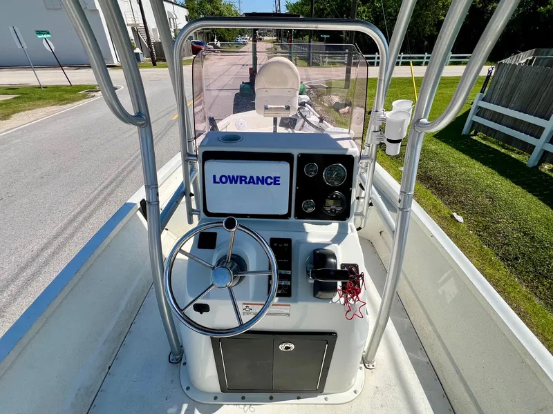 Slide: The Image of 2019 G3 Bay 20 DLX boat console with Lowrance navigation system on a sunny day. - 11