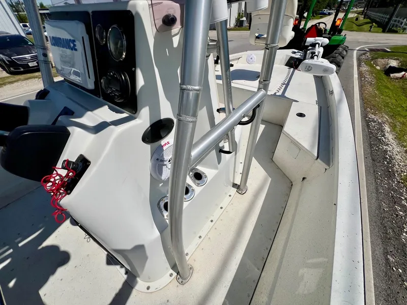 Slide: The Image of 2019 G3 Bay 20 DLX boat interior with steering console and seating area. - 15