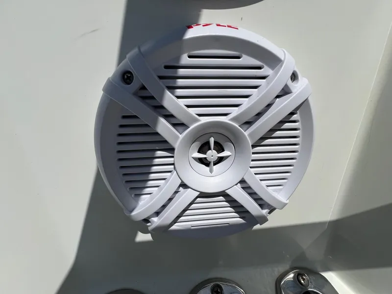 Slide: The Image of White speaker on 2019 G3 Bay 20 DLX boat, mounted on a light surface. - 19