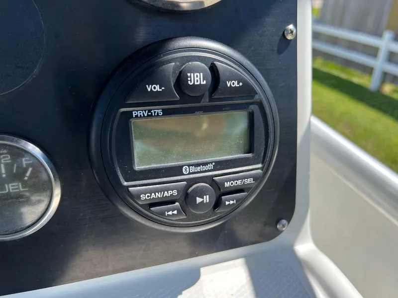 Slide: The Image of JBL PRV-175 Bluetooth stereo on 2019 G3 Bay 20 DLX boat dashboard. - 21
