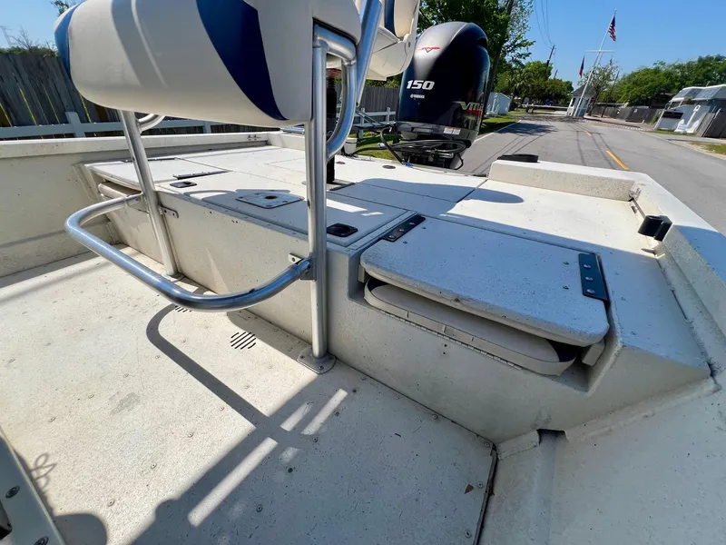 Slide: The Image of 2019 G3 Bay 20 DLX boat interior with seating and storage compartments. - 8