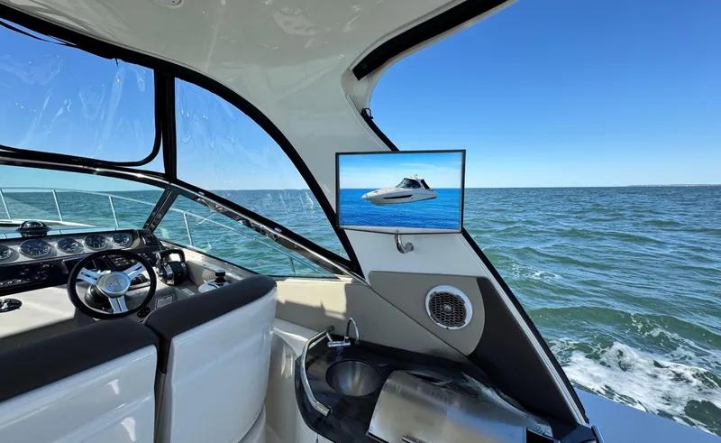 Slide: The Image of Interior view of 2014 Sea Ray 370 Sundancer yacht with ocean backdrop. - 24