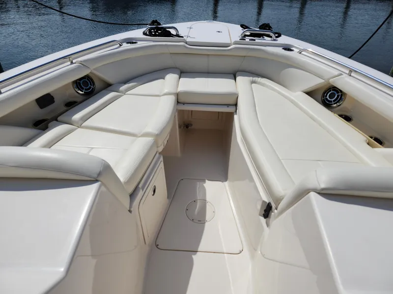 Slide: The Image of 2016 Grady-White Freedom 335 boat interior with spacious seating and sleek design. - 19