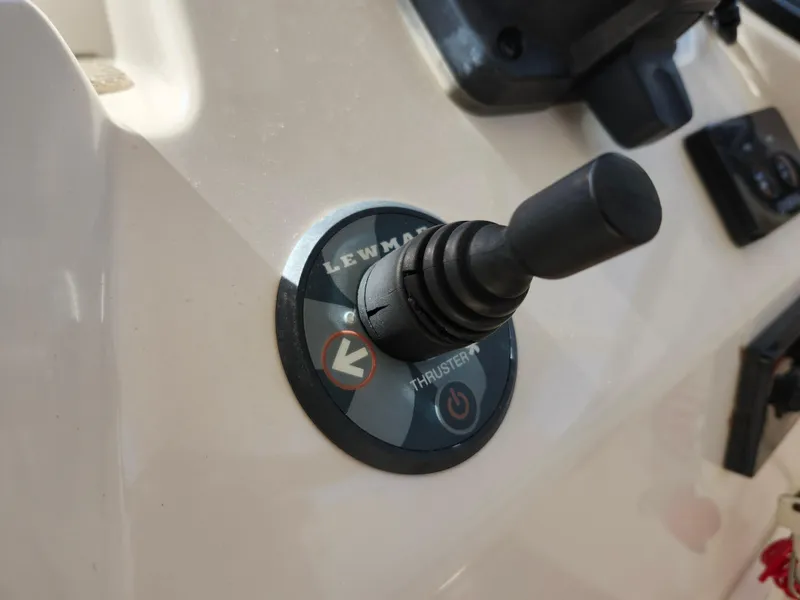 Slide: The Image of Joystick control on 2016 Grady-White Freedom 335 boat dashboard. - 29