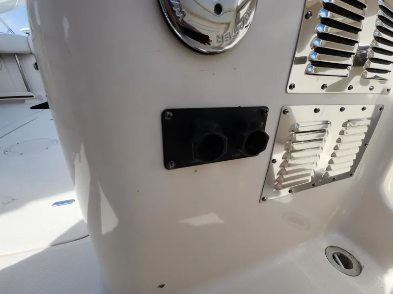 Slide: The Image of 2016 Grady-White Freedom 335 boat interior with ventilation and electrical outlets. - 32