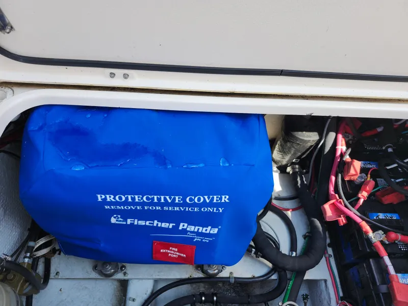 Slide: The Image of Blue protective cover on Fischer Panda generator in 2016 Grady-White Freedom 335 boat. - 35
