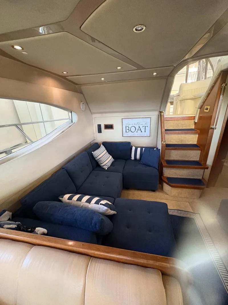 Slide: The Image of Luxurious interior of 2000 Cruisers Yachts 4450 Express Motor Yacht with plush seating. - 17