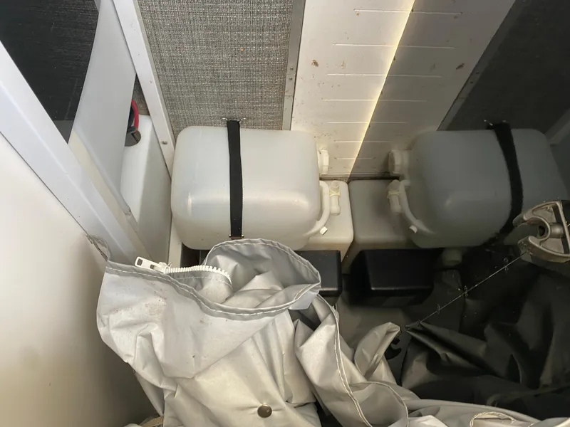 Slide: The Image of Interior of 2016 JC NepToon 23TT Sport with storage containers and fabric. - 24