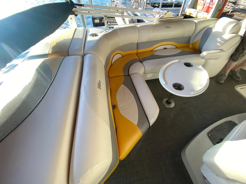 Slide: The Image of Luxurious seating on 2016 JC NepToon 23TT Sport pontoon boat with table. - 25